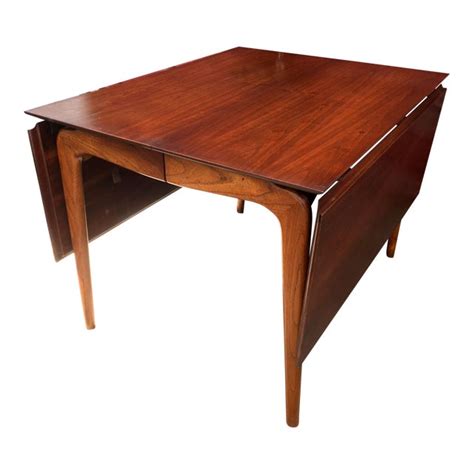 This drop leaf table blends into a white wall so that it appears almost hidden. Mid-Century Modern Lane Perception Drop Leaf Dining Table ...