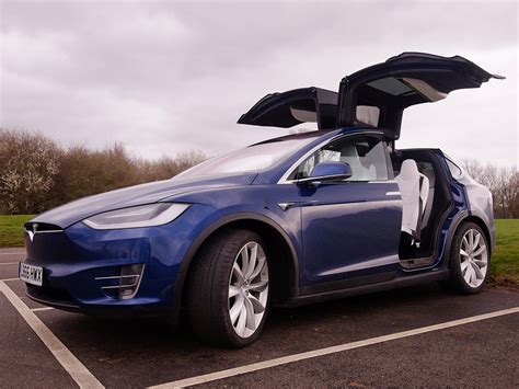 After all, its creators are positioning their products as cars. Tesla Model X 90D review | Stuff