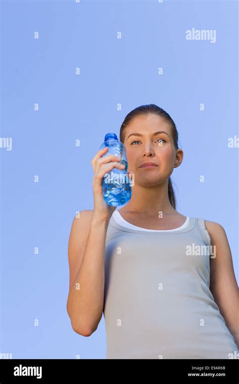 Young Woman Drinking Water Stock Photo Alamy