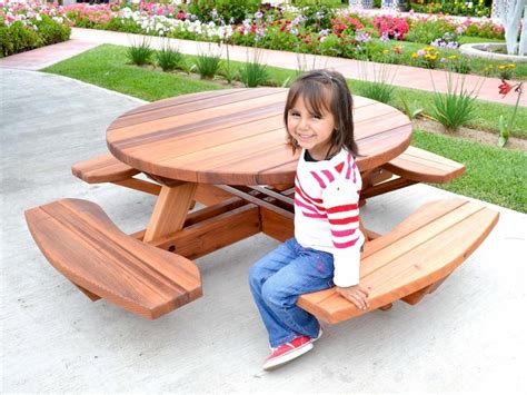 This picnic table is a classic design. Kid's Round Picnic Table Set, Built to Last Decades ...