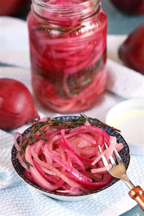 Place thinly sliced onions in a sieve or colander. How to Make Quick Pickled Red Onions - The Suburban Soapbox