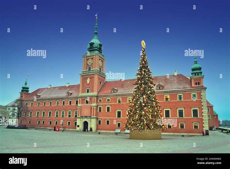 Royal Castle And Christmas Tree At Daybreak In The Warsaw Old Town