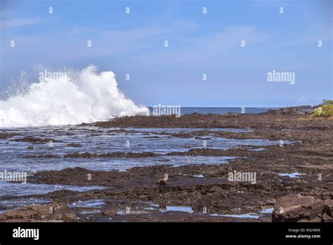 Waves Breaking On A Lava Rock Shoreline In Hawaii Stock Photo Alamy