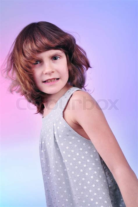 Pretty 8 Year Old Girl In Silver Dress Stock Image Colourbox