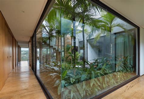 Modern House In Brazil Hides Glorious Tropical Garden Curbed