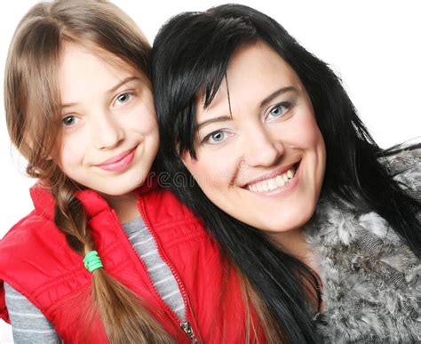 Mother And Her Daughter Smiling At The Camera Stock Photo Image Of