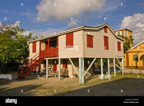 Caye Caulker Belize Traditional Wooden Cottage On Stilts With Shutters