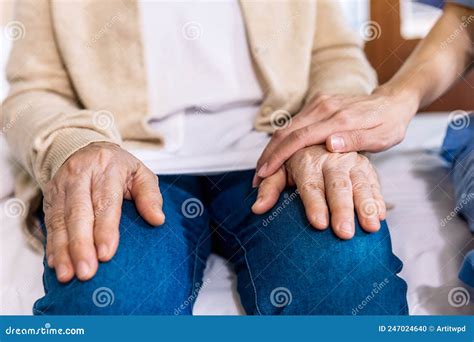 Close Up Senior Asian Woman Hand With Her Caregiver Helping Hands