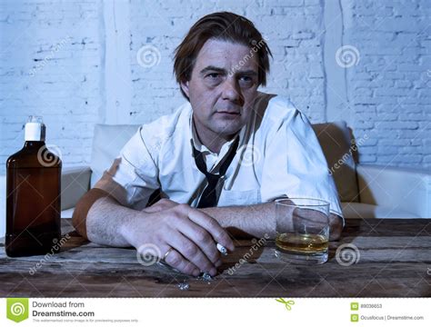 Depressed Alcoholic Businessman With Loose Necktie Wasted And Dr Stock