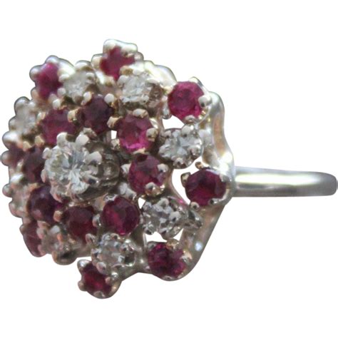 It ends looking classic, simple and endurin very unique and special like your lady love. Vintage 14K White gold Cluster Diamond and Ruby Ring from jkcollections on Ruby Lane