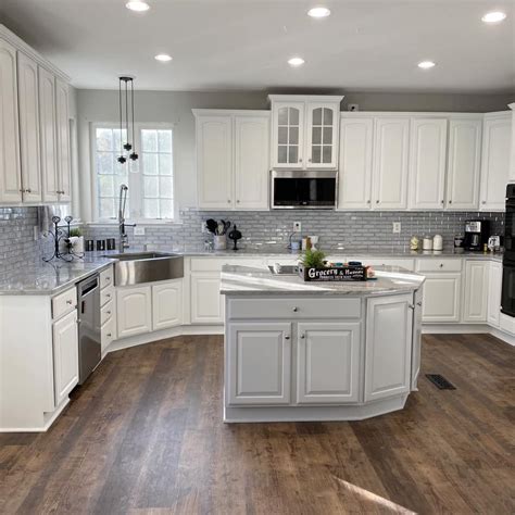 Does your kitchen have black appliances? Favorite White Kitchen Cabinet Paint Colors in 2020 ...