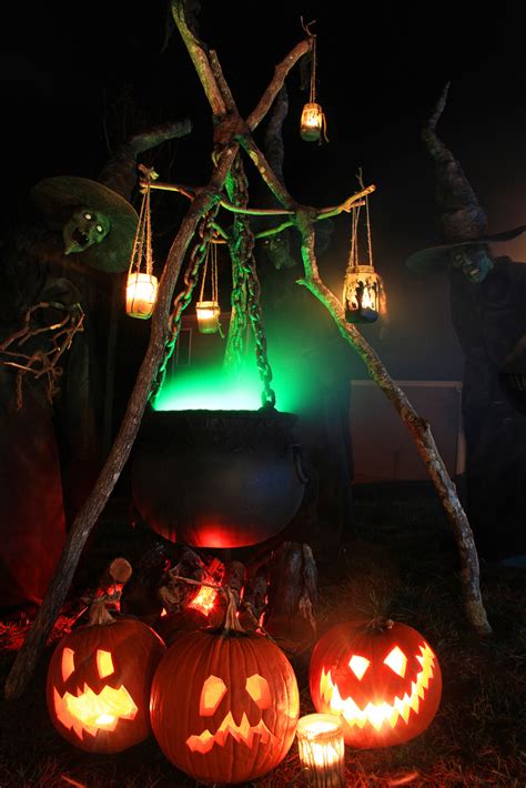 Halloween spirits made of milk jugs. 125 Cool Outdoor Halloween Decorating Ideas - DigsDigs