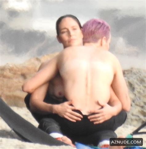 Megan Rapinoe And Sue Bird During A Romantic Photoshoot On The Beach In