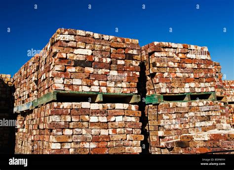 Building Materials Stacked Pallets Of Used Building Bricks At A Brick