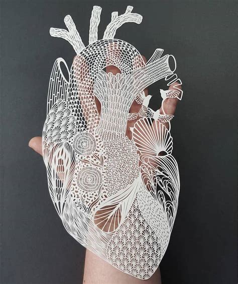 Artist Creates Intricate Cut-Outs From Single Sheet of Paper