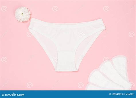 beautiful womenand x27 s panties with a sanitary napkins on pink background stock image image of