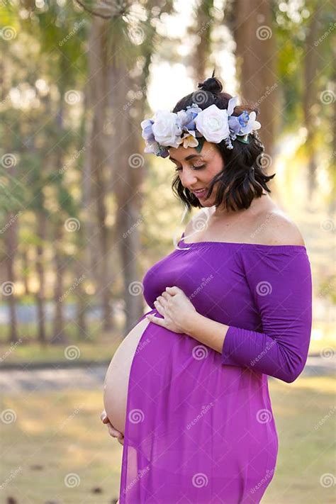 beautiful pregnant woman in sheer purple maternity dress with fl stock image image of abdomen