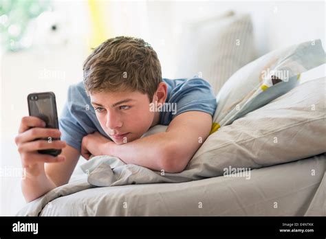 Teenage Boy Lying On Bed Hi Res Stock Photography And Images Alamy