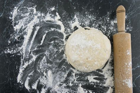 Freshly Prepared Dough On A Wooden Board Rolling Pin And Flour Stock