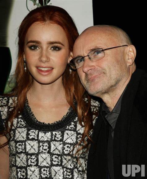 Photo Lily And Phil Collins Attend The Blind Side Movie Premiere In