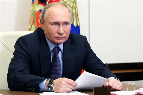 russian president vladimir putin laughs off ‘killer comments in interview ahead of switzerland