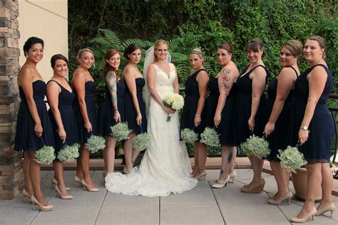 Navy Bridesmaid Dresses And Babys Breath Bouquets
