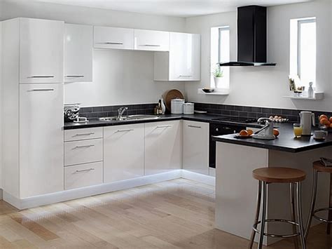 There are two colors with white and this kitchen looks very modern and cozy at the same time. 35+ Ideas about White Kitchen Cabinets at TheyDesign ...