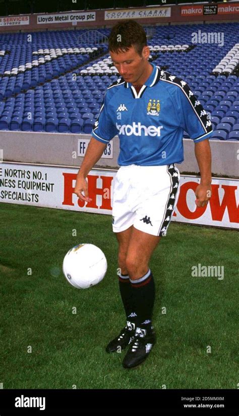 Ged Taggart Models The New Manchester City Home Strip Stock Photo Alamy