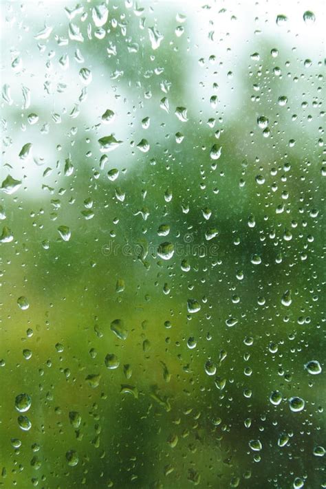 Raindrops On Window Pane With Blurred Background Stock Image Image Of