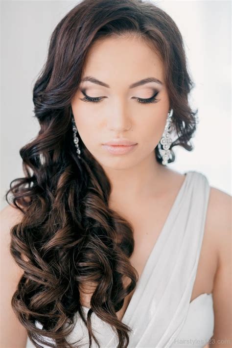 This can be teased up into a bun while keeping the curls visible. Brides Hairstyles