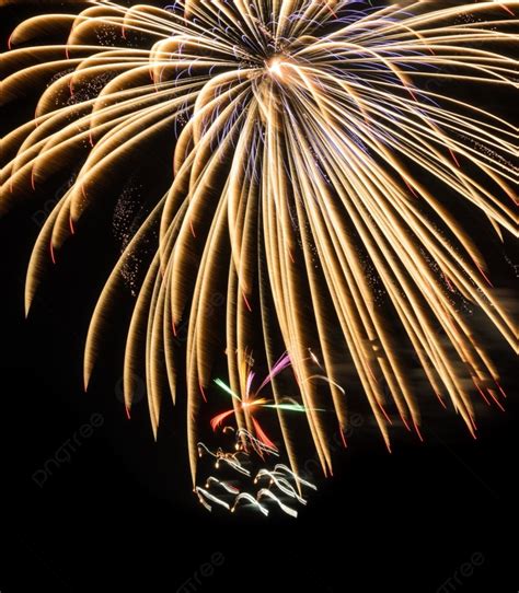 Colorful Fireworks Exploding In The Night Sky Photo Background And