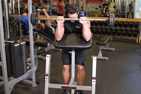 Reverse Barbell Preacher Curls Exercise Guide And Video