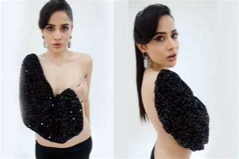 urfi javed goes semi nude in sexy shimmery black top with one side sleeve netizens ask aadha