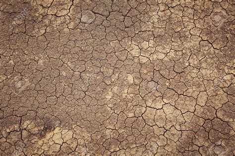 13851077 Dry Cracked Earth Background Clay Desert Texture Stock Photo