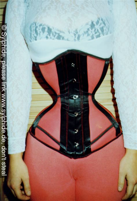 Gallery Of Pictures Of Sylphide In Tight Corsets In Underwear And With Everyday Clothes Worn