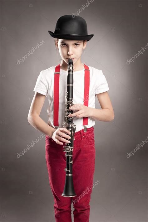 Little Girl Playing Clarinet — Stock Photo © Xavigm99