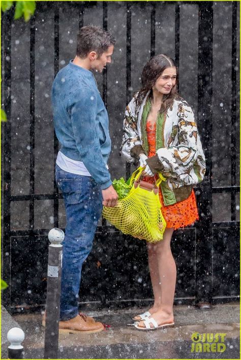 Photo Lily Collins Caught In Rain With Lucas Bravo Emily In Paris 26