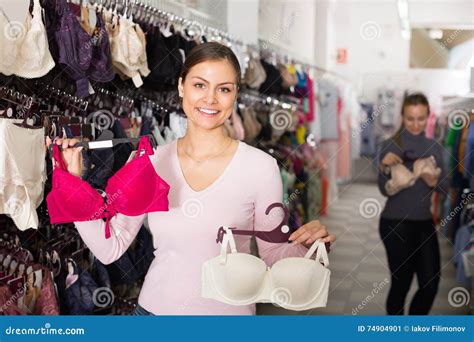 Woman Selecting Bra In Lingerie Store Stock Image Image Of Customer Selecting 74904901