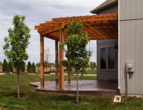 House Cedar Pergola With Stamped Concrete Patio Traditional Patio Kansas City By All