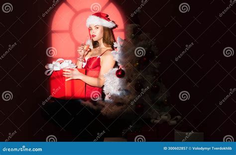 Excited Woman In Red Santa Claus Outfit Holding Present Nude Woman Stock Image Image Of Model