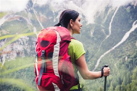 Woman Hiker Walks On Mountains By Stocksy Contributor Mauro Grigollo