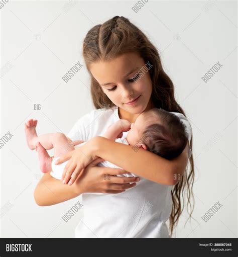 Little Girl Holding Image And Photo Free Trial Bigstock
