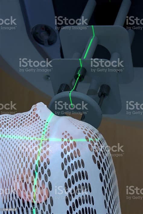 Man Receiving Electron Radiation Therapy For Cancer Stock Photo