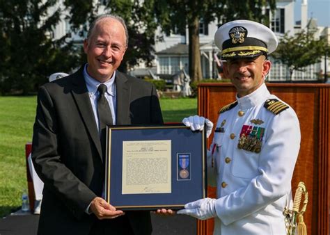 Booth Received Second Meritorious Civilian Service Award Naval