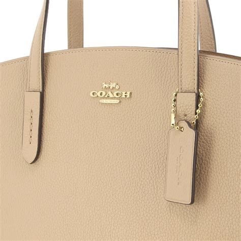 Coach Outlet Charlie Shopping Bag In Grained Leather Beige Coach