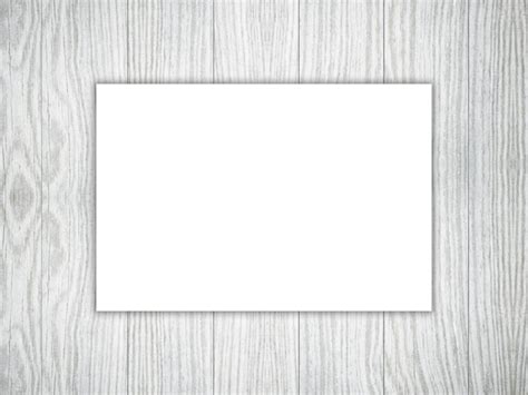 3d Blank Piece Of White Paper On A Wooden Texture Photo Free Download