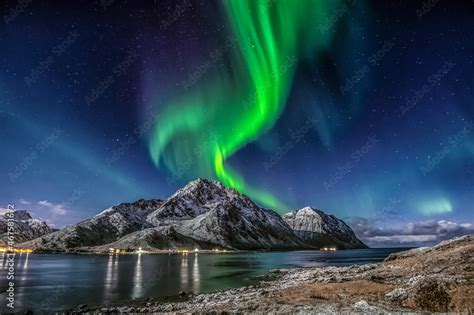 Aurora Borealis The Northern Lights On Sky In Lofoten Islands
