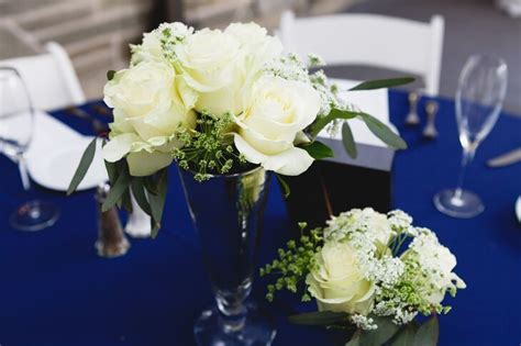 White Roses In Mercury Glass Vases