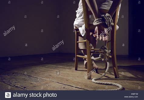 Woman Tied Chair Stock Photos & Woman Tied Chair Stock 