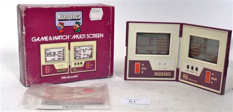 An Original Nintendo Game And Watch Multiscreen Mario Bros Handheld